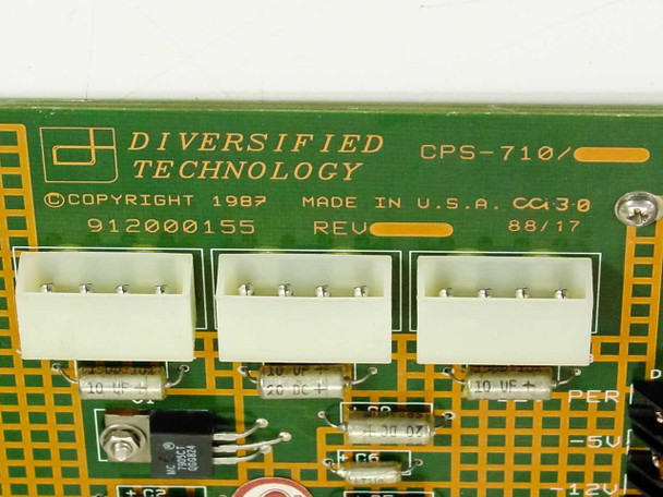 Diversified Technology CPS-710 close-up of manufacturer label showing model, MPN 912000155, copyright 1987, Made in USA, date code 88/17, and three power header connectors J2 J3 J4