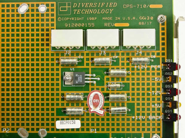Diversified Technology CPS-710 component detail showing LED voltage indicators labeled +12V PER, -5V, -12V, +5V, +12V BACK and voltage regulator IC