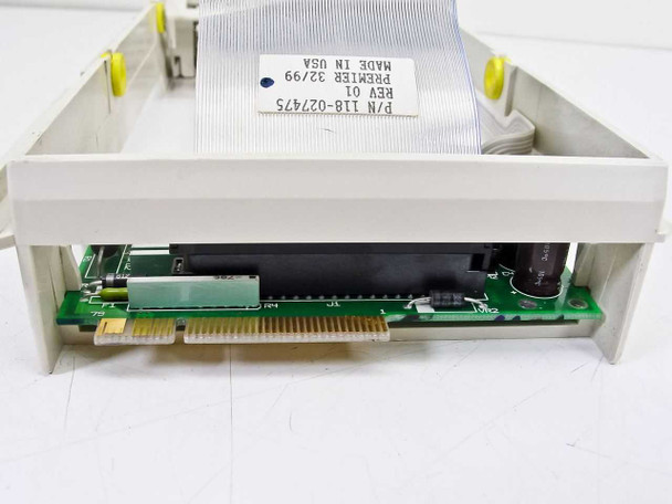 Premier 118-027475 caddy rear interior — label showing P/N 118-027475, REV 01, PREMIER 32/99, MADE IN USA, with gold-finger PCB visible