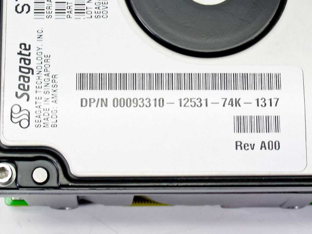 Seagate ST19171WC label close-up showing Dell DP/N 00093310-12531-74K-1317 and Rev A00, Made in Singapore