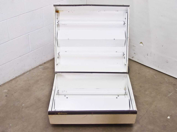 Both Multiplex light box table sections open — fluorescent tube banks visible in top and bottom sections, rust on upper corners