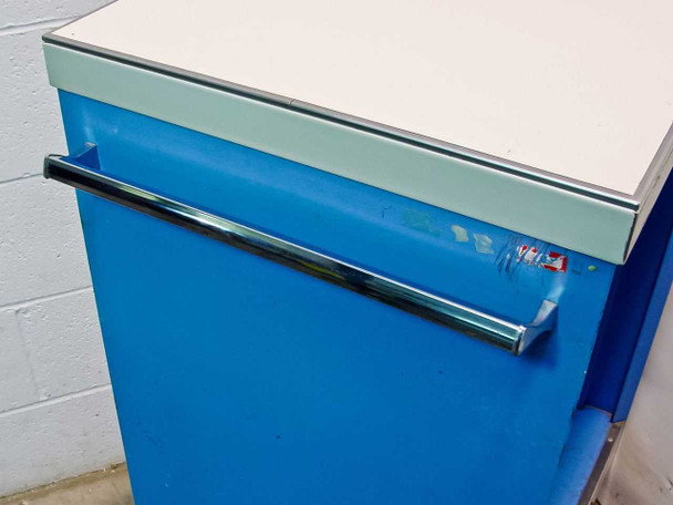 Wright Line blue cart — side view showing chrome tubular push handle and white laminate top surface detail