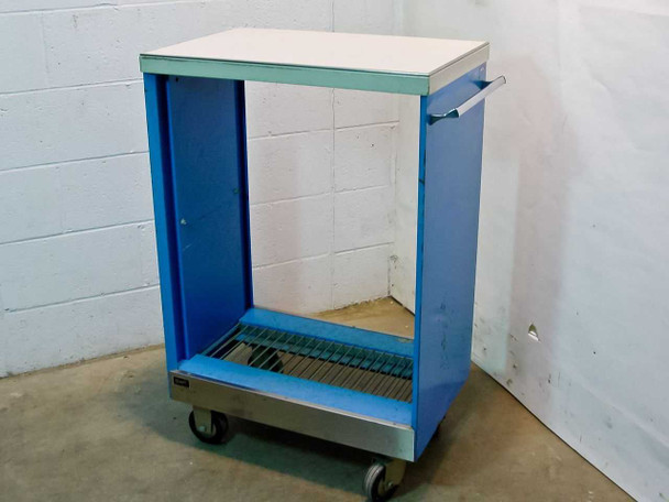 Wright Line Data Processing Accessories blue mobile rolling cart — front-left three-quarter view showing open bay interior and vented bottom grate