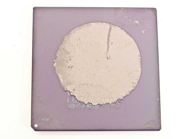 Intel Pentium 100MHz CPU BP80502100 SU099/SSS — top (heat spreader) view showing purple ceramic package