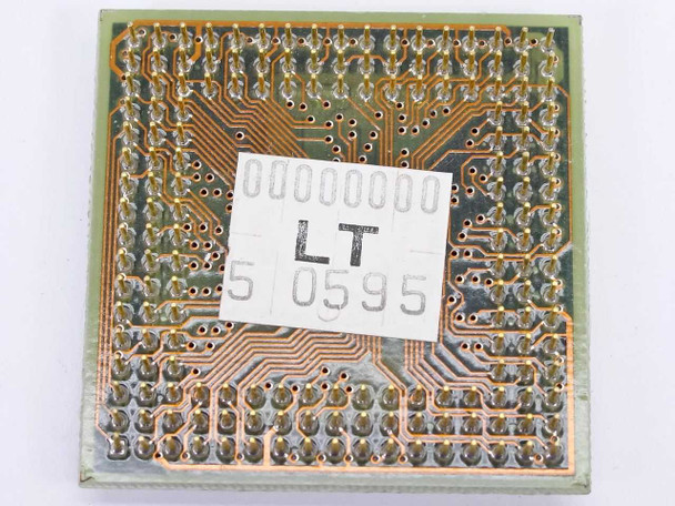 Intel KU80486SX-33 SX673 CPU bottom view showing PQFP ceramic substrate, gold contact pads, and inventory label
