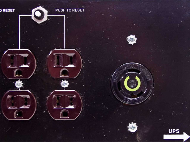 Liebert MP130E outlet panel close-up showing 4 NEMA outlets, two Push to Reset circuit breaker buttons, and Hubbell Twist-Lock UPS output receptacle (30A, 125V)