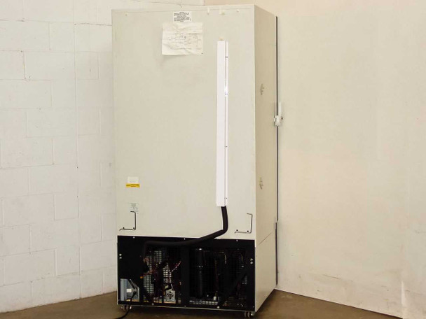 Queue Systems QU2195D12 Cryostar – rear view of freezer cabinet showing compressor and refrigeration components at base, power cable, and rear panel label