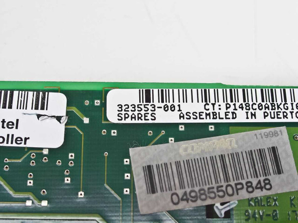 Compaq 323553-001 label close-up showing part number, CT code, and Assembled in Puerto Rico marking