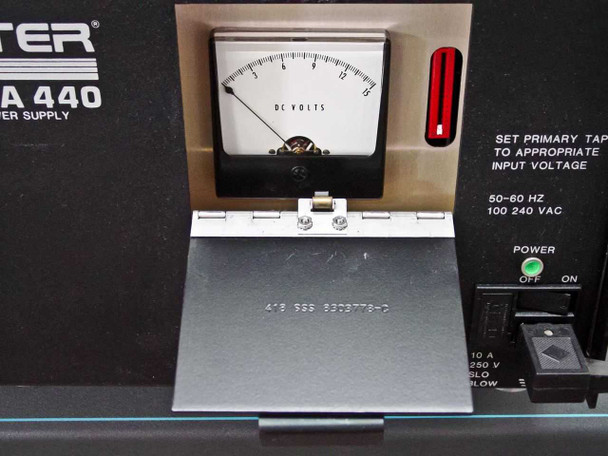Coulter Delsa 440 Remote Power Supply with hinged access panel open revealing DC Volts analog meter and internal label