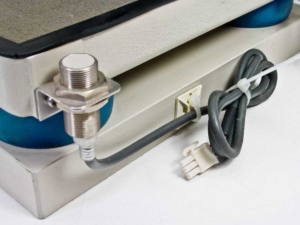 IMES SA2-40P chamber base detail — blue vibration isolator, stainless steel threaded sensor/transducer port, gray sensor cable with JST-style connector