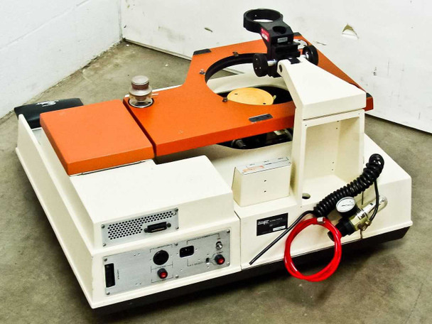 Rucker & Kolls 1032 Wafer Prober — rear/side 3/4 view showing orange stage, rear control module, pneumatic coiled hose with pressure gauge, and air supply connections