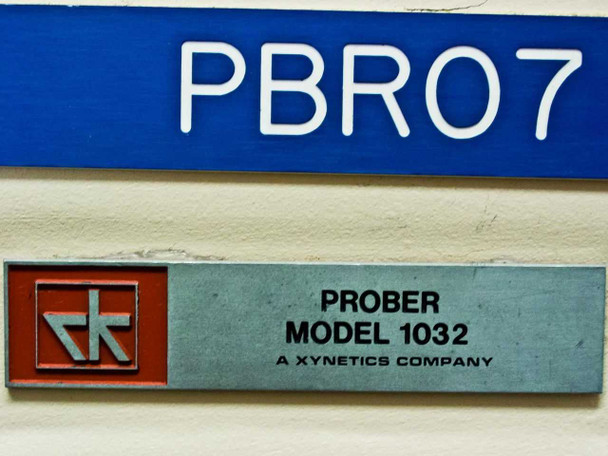 Nameplate: 'PROBER MODEL 1032 / A XYNETICS COMPANY' with Rucker & Kolls R&K logo, and PBR07 blue asset tag above