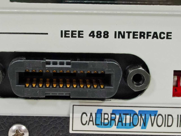 UDT S380 Optometer – close-up of IEEE 488 GPIB interface connector and UDT Instruments calibration void seal sticker on rear panel