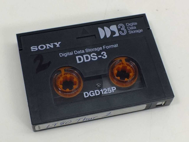 Sony DGD125P DDS-3 cartridge tape shell showing dual tape reels, DDS-3 branding, and handwritten label on spine