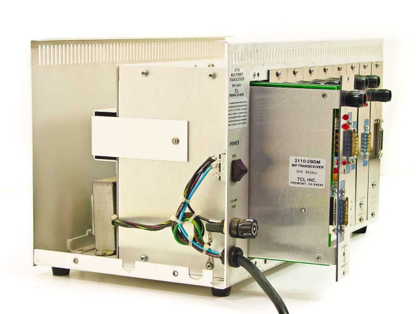TCL 2110 Multiport Transceiver rear view showing backplane wiring, power cable exit, and partially ejected 2110-2BDM card with label