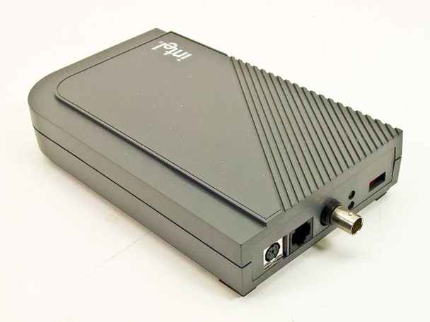 Intel NetportExpress XL 309304 coax print server — left-side view showing BNC coax port, DIN power port, and RJ connector