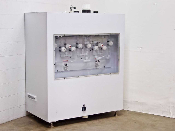 FSI ChemFill Chemical Canister Module rear view showing polypropylene valve manifold panel with multiple solenoid valves and tubing connections