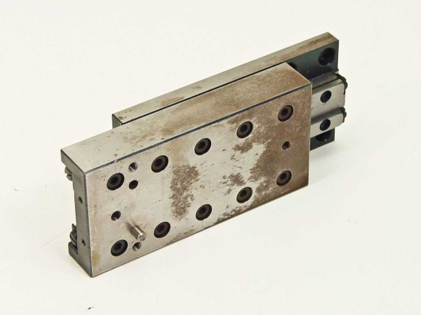Schneeberger NK 2-80 linear slide side and end view — carriage partially retracted, recirculating ball rail guides visible on right side