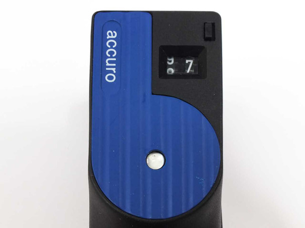 Drager Accuro pump top closeup showing 'accuro' label, mechanical stroke counter reading 7, and pump lock switch