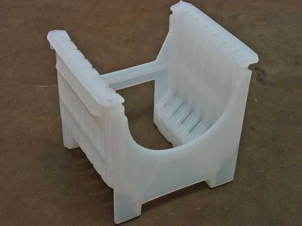 Fluoroware Entegris A182-60MU 13-slot 150mm wafer carrier cassette – front three-quarter view showing open frame and slot fingers