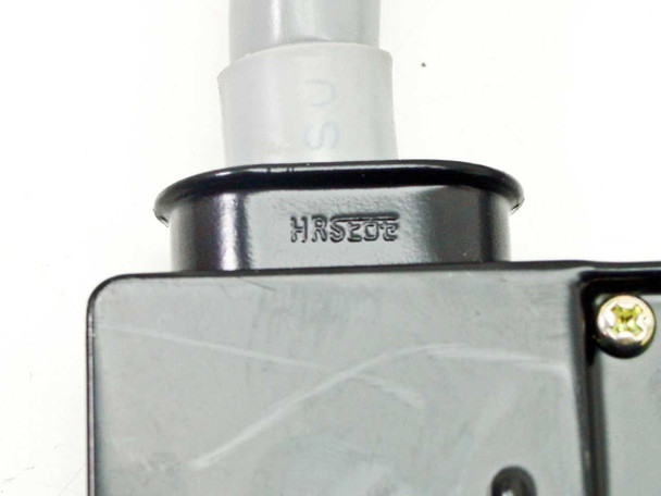 Close-up of metal-shell rectangular connector end with HRS2U5 stamp on collar and gray cable entry