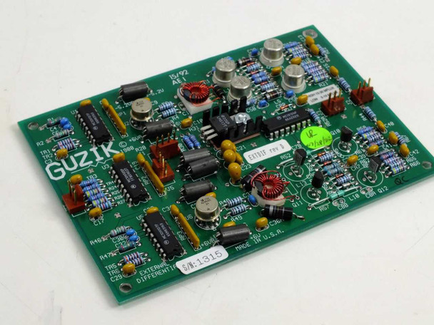 Guzik 300663 External Differential AEI PCB front view showing full component side with ICs, inductors, and capacitors