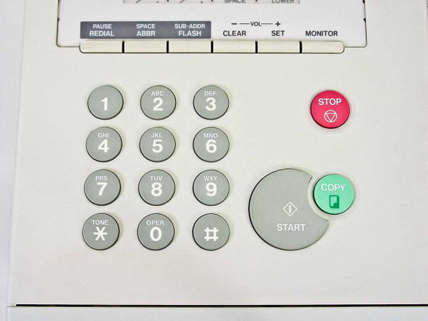 Panasonic UF-770 numeric dialpad with 12-key layout, START button, red STOP button, and green COPY button