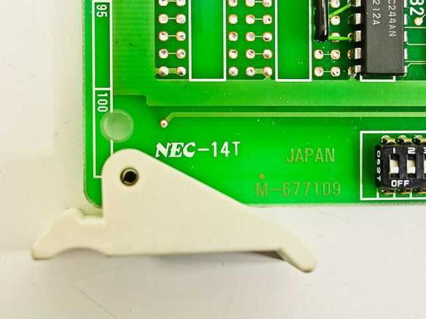 NEC NEC-14T circuit card close-up showing NEC-14T model designation, M-677109 part number, and Japan country of origin label with card retaining clip
