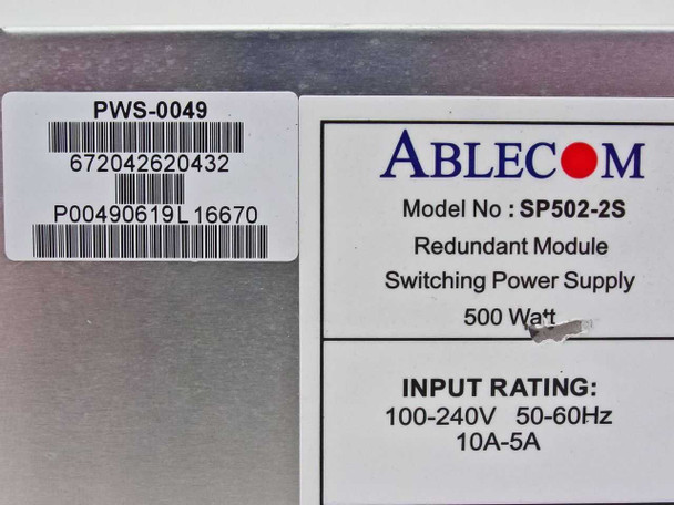 Ablecom SP502-2S label close-up showing model number, PWS-0049 part number, 500W rating, and 100-240V 50-60Hz input specs