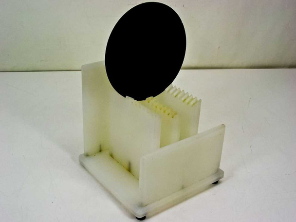 Unbranded 6-inch 150mm 12-slot HDPE benchtop silicon wafer holder — angled three-quarter front view showing full carrier body with a 150mm wafer displayed in the front slot