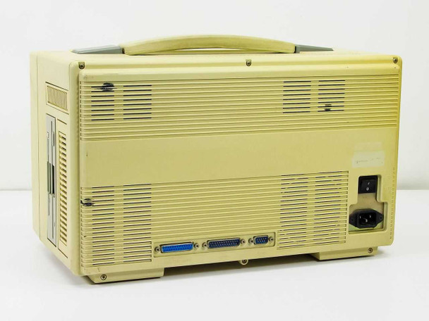 Novell LNalyzer BSI portable lunchbox PC — rear view showing vented panel, parallel and serial ports, and IEC power inlet