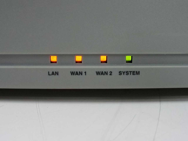 Cray Communications MR-1010 MatchBox Router front panel close-up showing LAN, WAN 1, WAN 2, and SYSTEM indicator LEDs