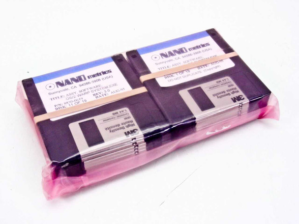 Nano Metrics 8830-0619 OS/2 Warp System Software — two sub-sets of diskettes sealed in pink anti-static bags showing Disk 1 of 19 and Disk 11 of 19 labels