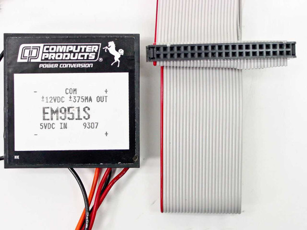 Computer Products EM951S label closeup showing ±12VDC ±375mA output, 5VDC input, and date code 9307 alongside flat ribbon cable connector