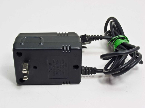 Sino-American A42410CG AC Adapter rear/plug side showing US two-prong AC input prongs and CAUTION label