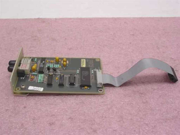 Cabletron SPIM-F2 9000170-02 fiber optic module rear PCB view showing component side with ribbon cable attached