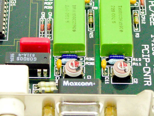 Keithley PC7422 board close-up – GORDOS 8631A-4 component, Maxconn label, green TCXO capacitors and trim pots visible