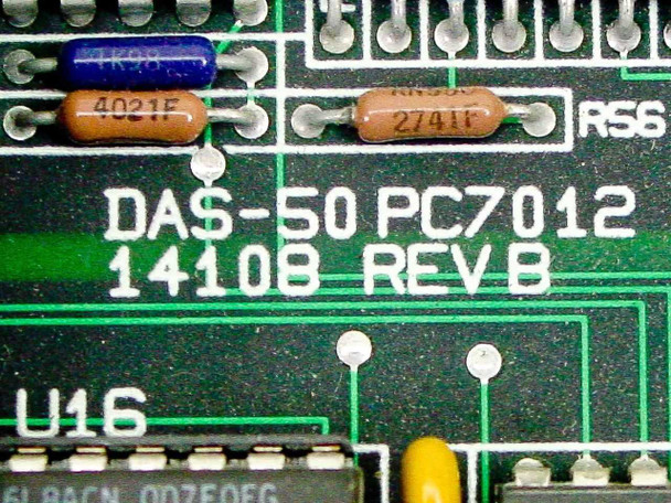 Keithley DAS-50 PC7012 board marking close-up showing silkscreen text DAS-50 PC7012, 1410B REV B