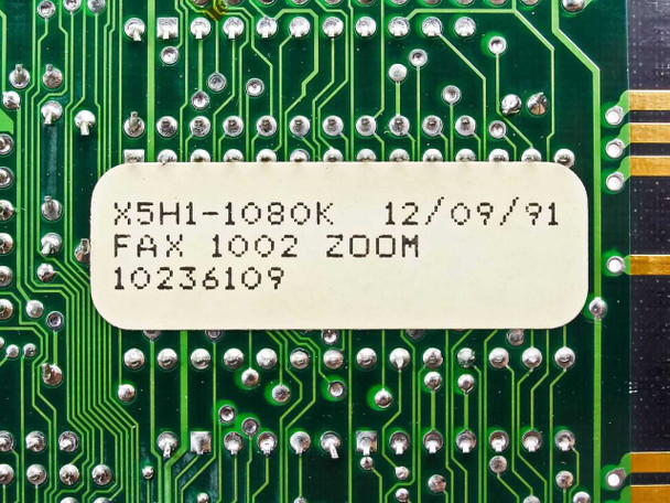 Zoom X5H1-1080K close-up of board label showing model X5H1-1080K, FAX 1002 ZOOM, part number 10236109, date 12/09/91