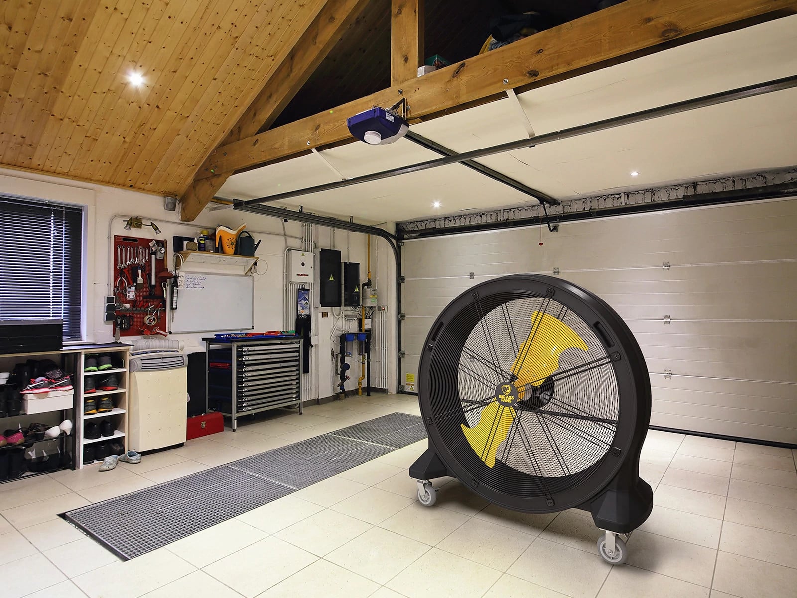 Bandit barrel fan on a garage.