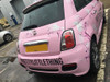 A stunning vehicle wrap showcasing MetaCast® MDC – Performance Redefined Digital Cast Film applied to a sleek car. The vibrant, high-quality print on this premium cast film highlights the film's ability to conform to complex curves, contours, and channels of the car's body, ensuring a flawless, professional finish. The smooth, matte texture of the wrap reflects the film's superior repositionability and high adhesive strength. The MetaCast® MDC wrap enhances the vehicle’s appearance with sharp, vibrant colors, and the film’s ability to adhere seamlessly to challenging surfaces demonstrates its exceptional conformability and ease of application.