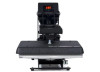 The MAXX® Clam Heat Press 15x15 by Stahls' shown open on a workstation, featuring the 15-inch platen, digital control panel, and sturdy steel frame.