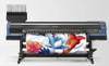 Image of the Mimaki TS55-1800 printing vibrant dye sublimation graphics on transfer paper, featuring jumbo roll feeding and industrial-grade output for textile production.