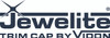 In this image, the Jewelite Trim Cap sample is laid horizontally, offering a detailed view of its overall profile and design features. The photograph clearly captures the trim cap's consistent color, seamless edges, and engineered texture. This perspective demonstrates the cap’s suitability for securely attaching transparent thermoplastic signage faces to lighting enclosures.