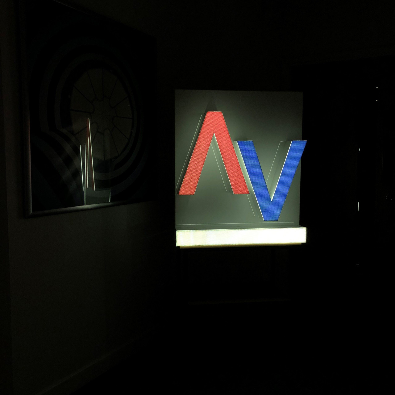 Contra Vision Black 80/20 dual color perforated film installed on smoked window