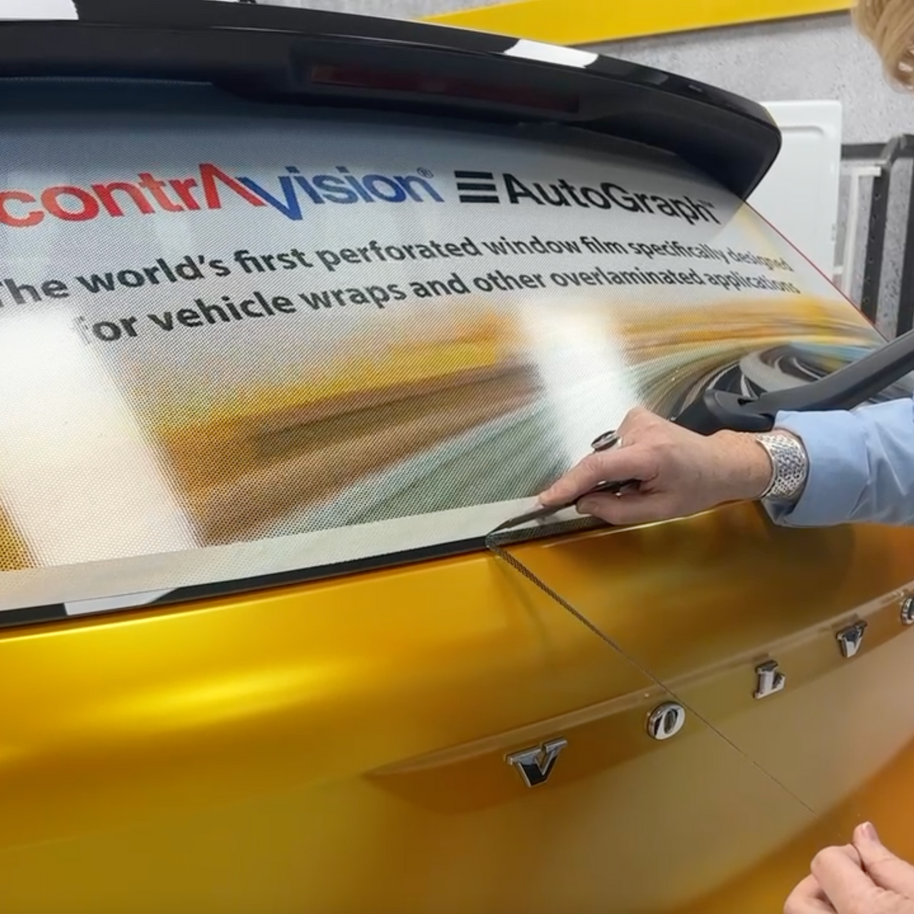 AutoGraph White on Black perforated window film for printing one-way vision graphics. It is specifically designed for vehicle windows and other overlaminated applications.