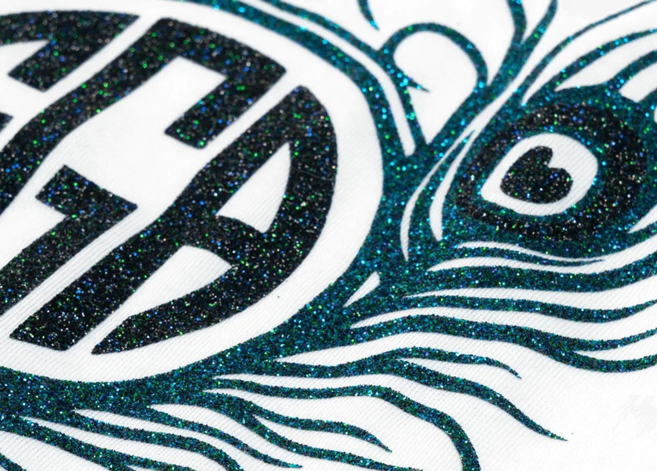 Glitter Flake™ is best known as textured glitter heat transfer vinyl used to produce vibrant designs. This unique, bling material is perfect for creating stand-out looks for fan and spirit wear, cheer uniforms, fashion garments, and more.