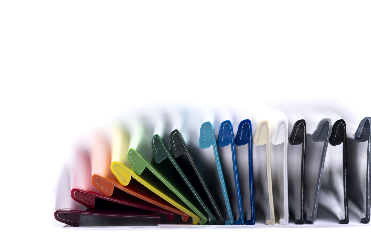 This image showcases a Jewelite Trim Cap sample standing upright on a clean, minimalist background. The 2" trim cap is prominently displayed, emphasizing its robust design, smooth finish, and vibrant color. The clear view highlights the product’s precise edges and high-quality construction, ideal for dimensional signage and channel letter applications.