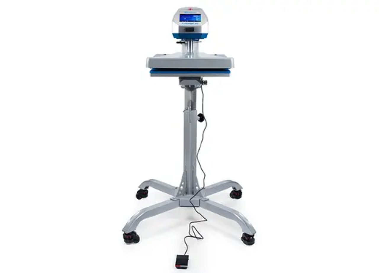 Hotronix® Air Fusion IQ® Heat Press 16x20 with pedestal base shown fully assembled in a print shop setting—highlighting the swing-style platen, IQ® touchscreen, and pedestal with locking wheels.