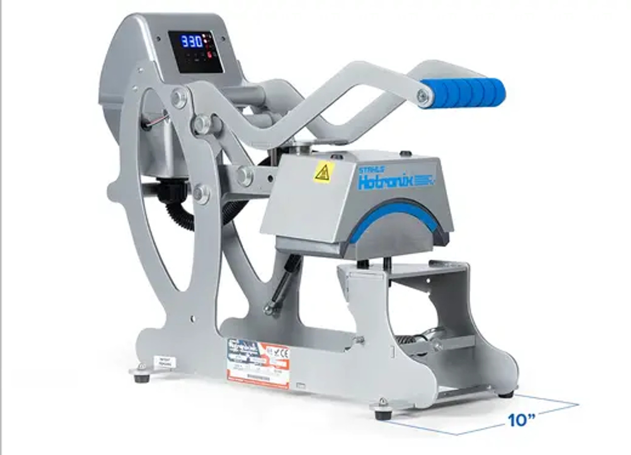 Hotronix® Cap Heat Press by Stahls' shown with its curved lower platen and compact clamshell design, ideal for customizing hats and caps.
